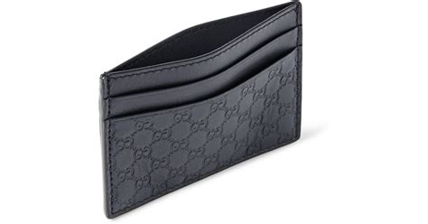 gucci card holder for men.